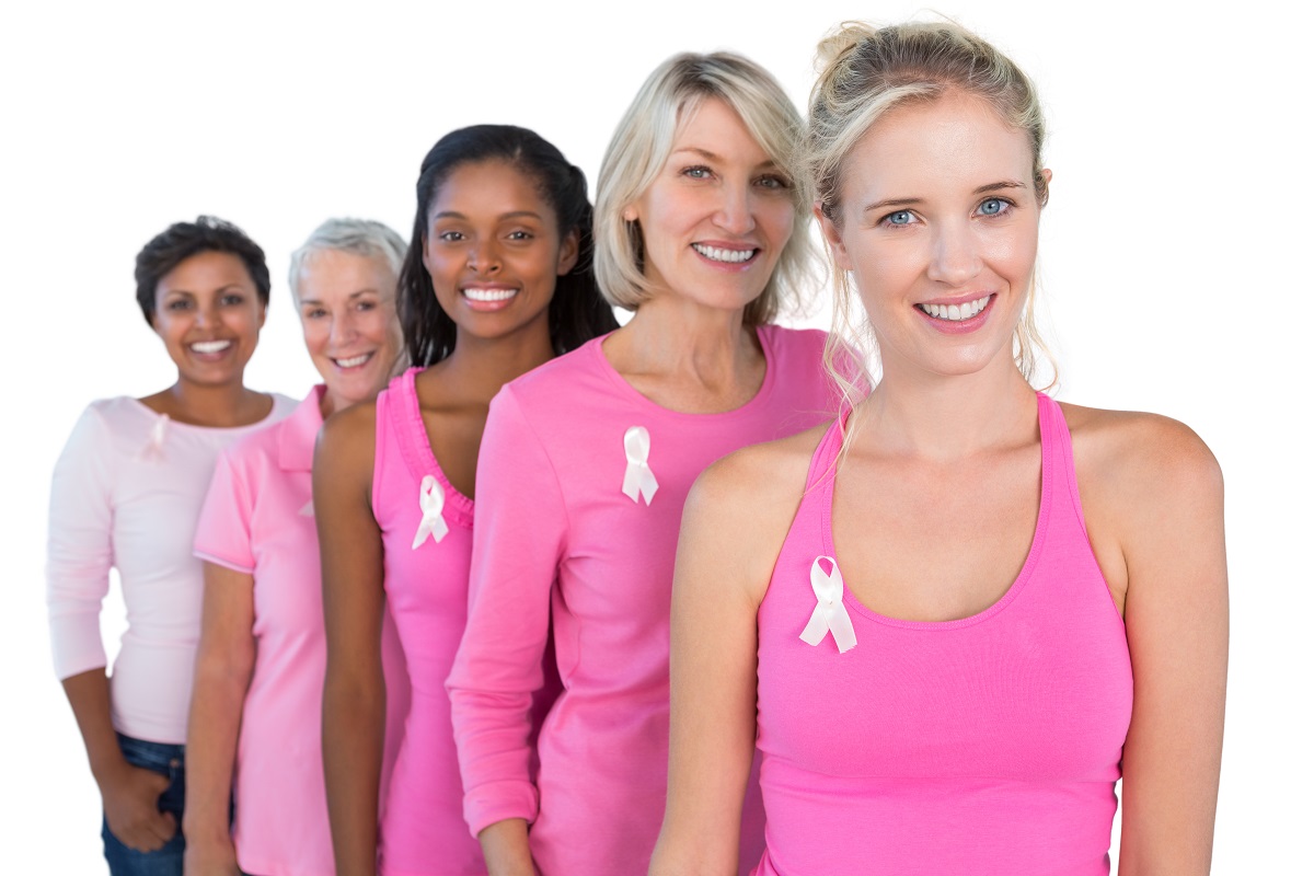 women wearing pink clothes and white ribbon for breast cancer awareness