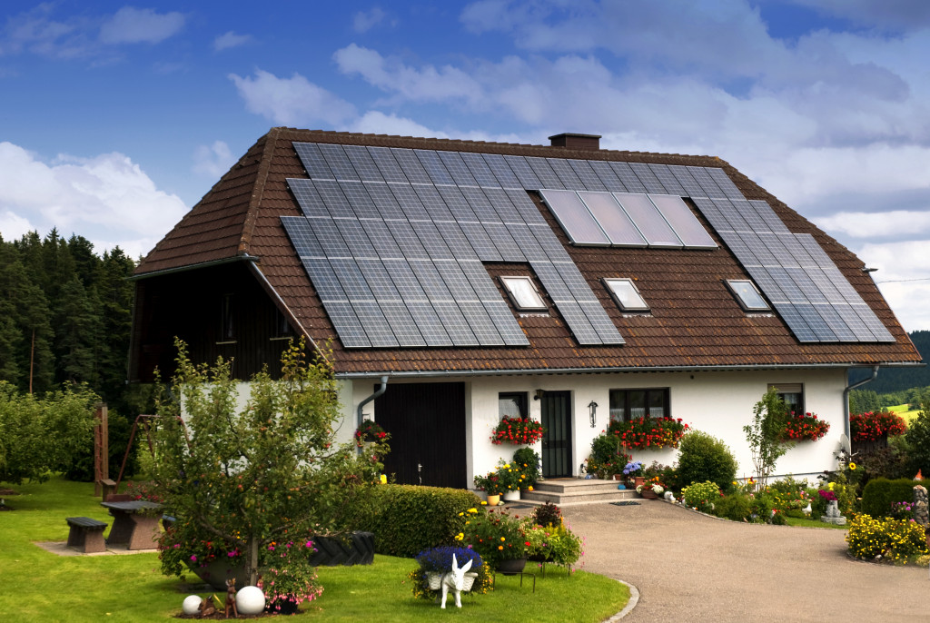 A classic home with solar panels on the roof